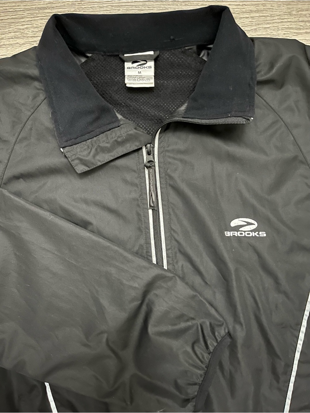Brooks Black Men's Half-Zip Windbreaker Jacket with Reflective Trim